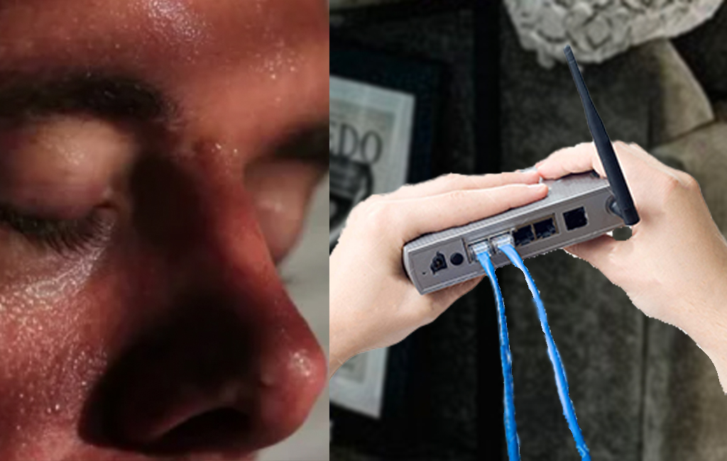 Man sweating looking for wifi password on router