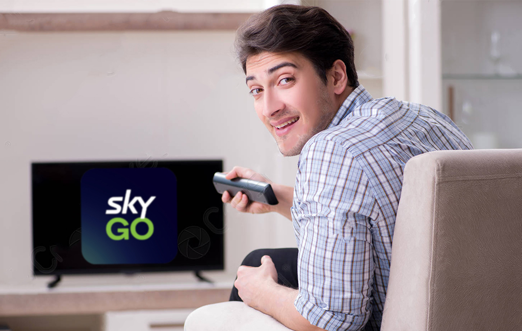 man on couch with skygo