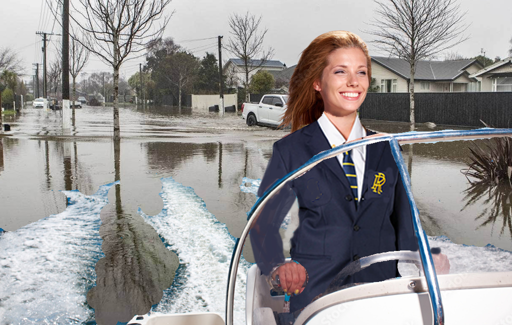 Rangi Ruru Girls student driving boat in Christchurch floodwaters