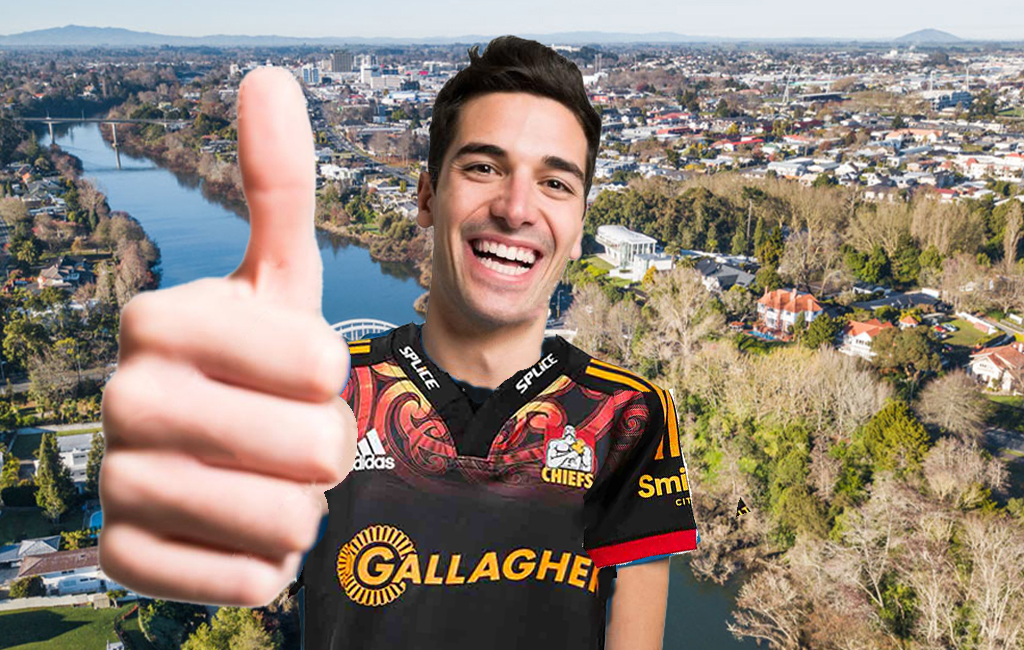 Chiefs fan gives the thumbs up with waikato river in the background