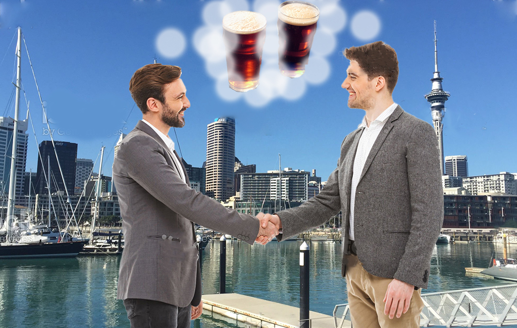 men shaking hands on viaduct thinking of beer
