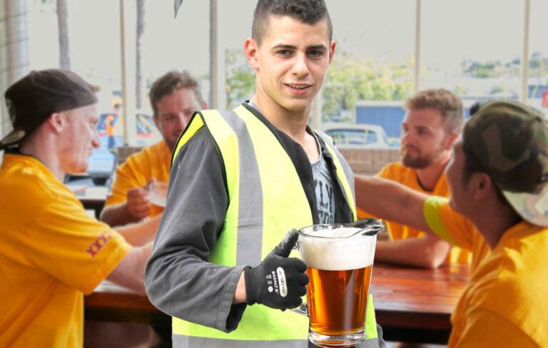 Young lad in hi vis with beer jug