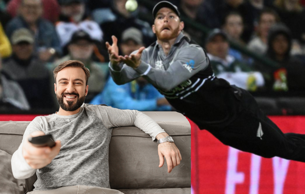 Man on couch watching repeats of Glenn Phillips catch