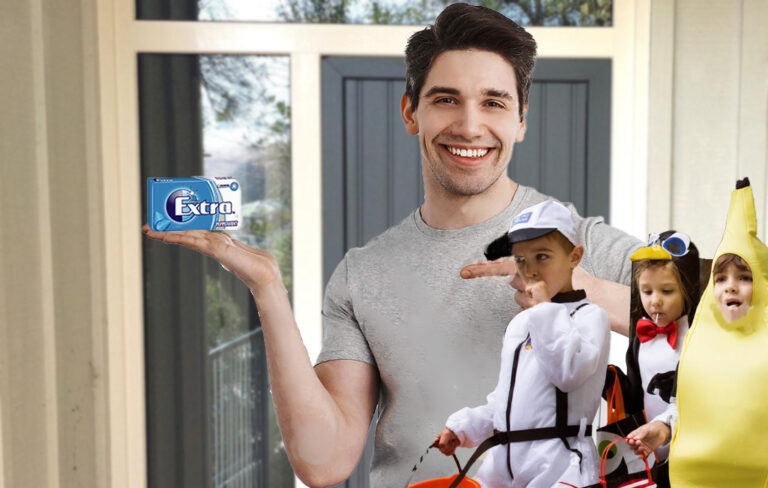 man offering chewing gum to trick or treaters