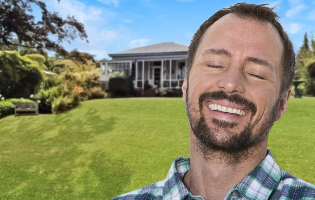 Satisfied man with lawn in background