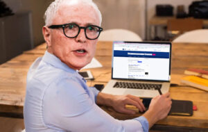 Michael Baker on Seek on the laptop