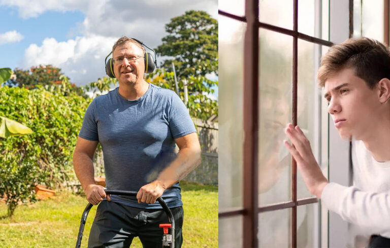 young man looking out the window at older man mowing lawn