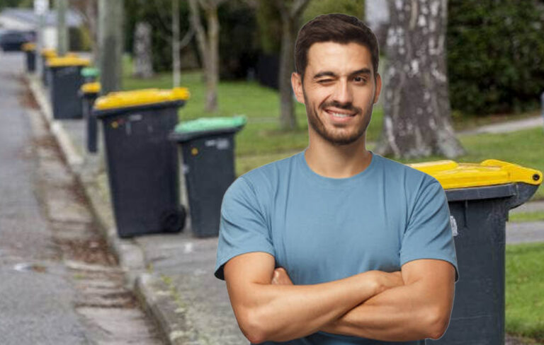 man winking with recycling in the background