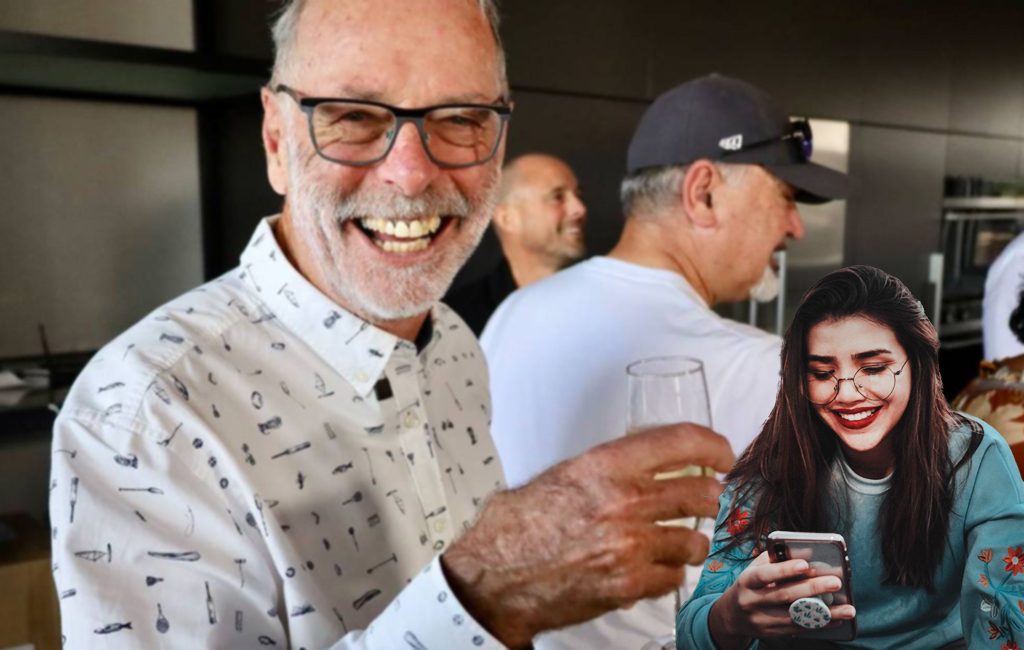 Wayne Brown with champagne, while millennial woman looks at phone.