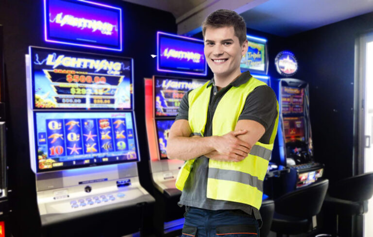 Man pleased with himself in front of pokie machines.