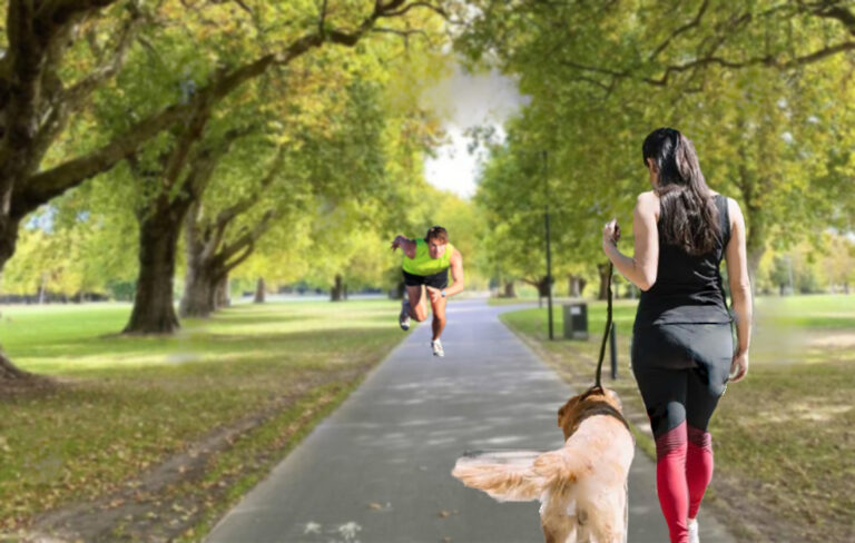 man sprinting towards woman who is out walking the dog.
