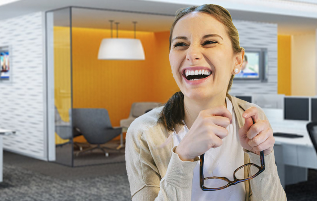woman laughing in office
