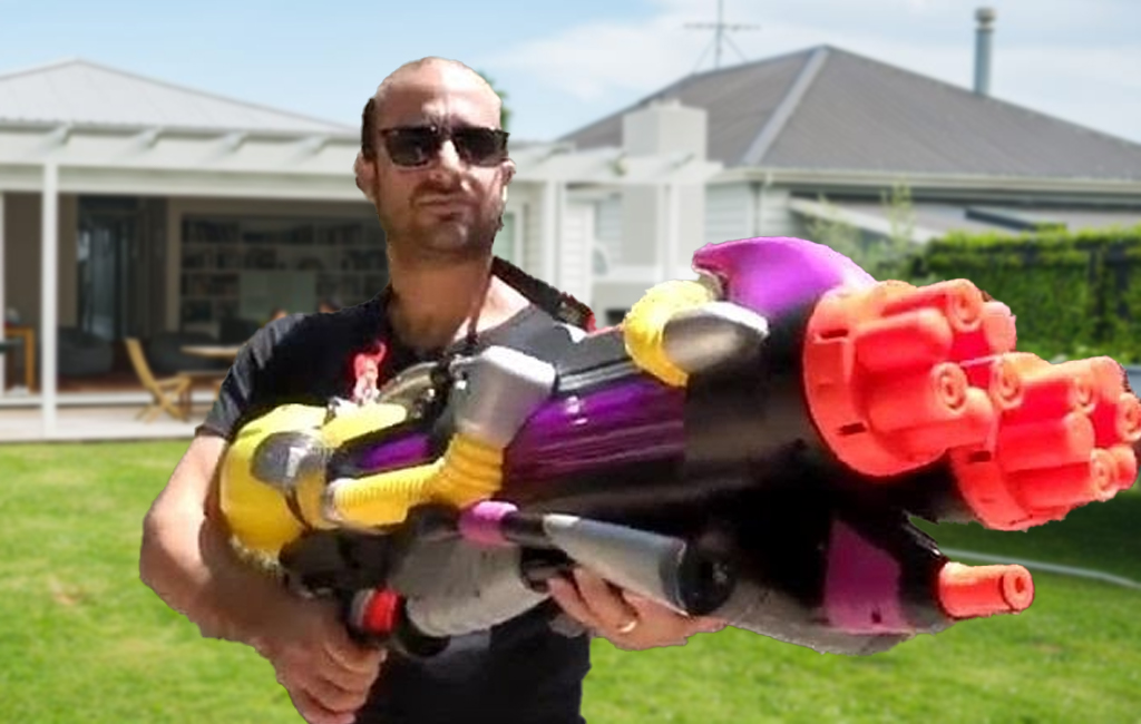 grown man with large super soaker