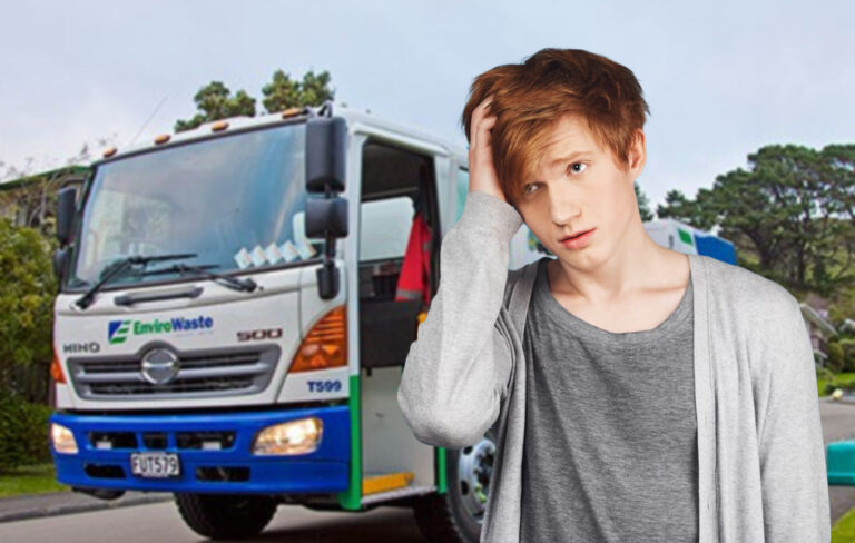 man stressing out in front of recycling truck.