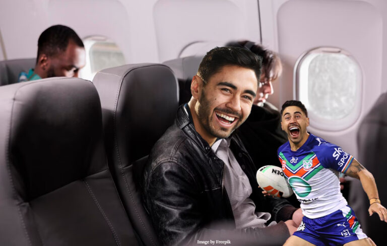 shaun johnson laughing on plane.