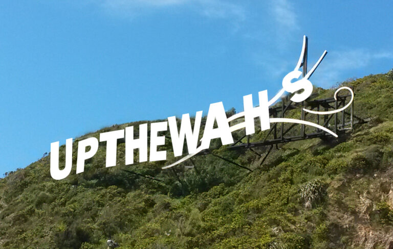 Wellington's "Wellington" sign, but with "UpTheWahs"