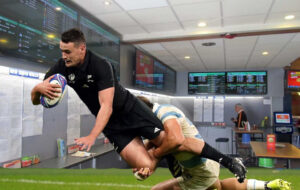 will jordan scoring for all blacks with TAB interior in the background.