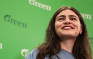 Chloe Swarbrick with green background