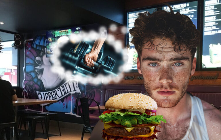 man with burger at burger place, thinking about lifting weights at gym.