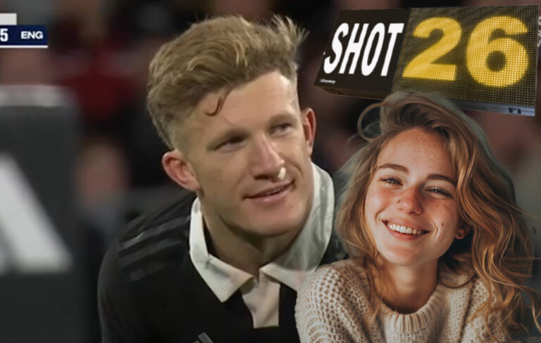 damian mckenzie smiling with shot clock and female fan smiling also