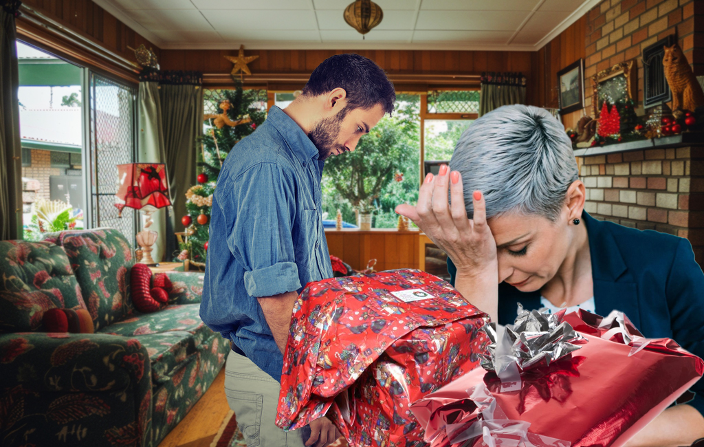 man looking dejected as disappointed mum looks at poorly wrapped gifts.