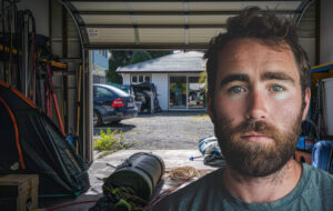 man in messy garage