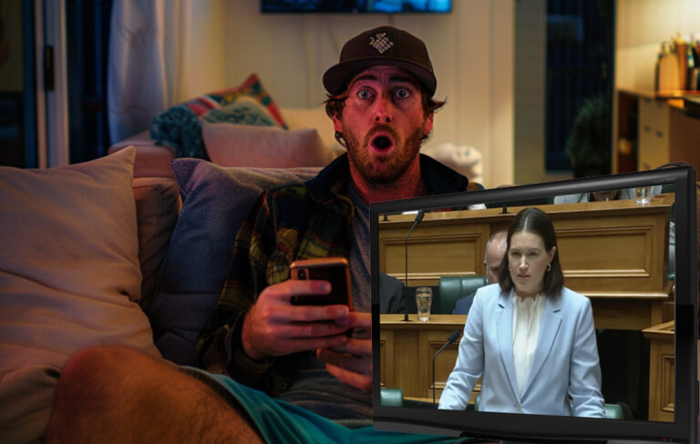 man on the couch and brooke van velden on tv