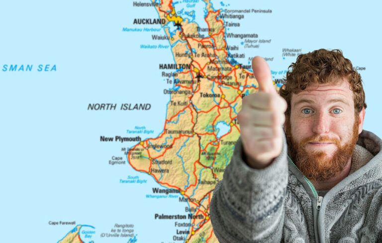 man giving thumbs up in front of map