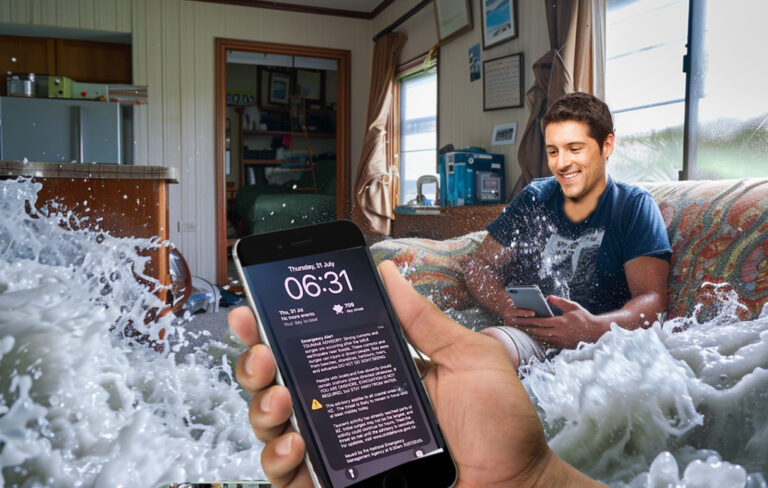 Man in lounge surrounded by tsunami.