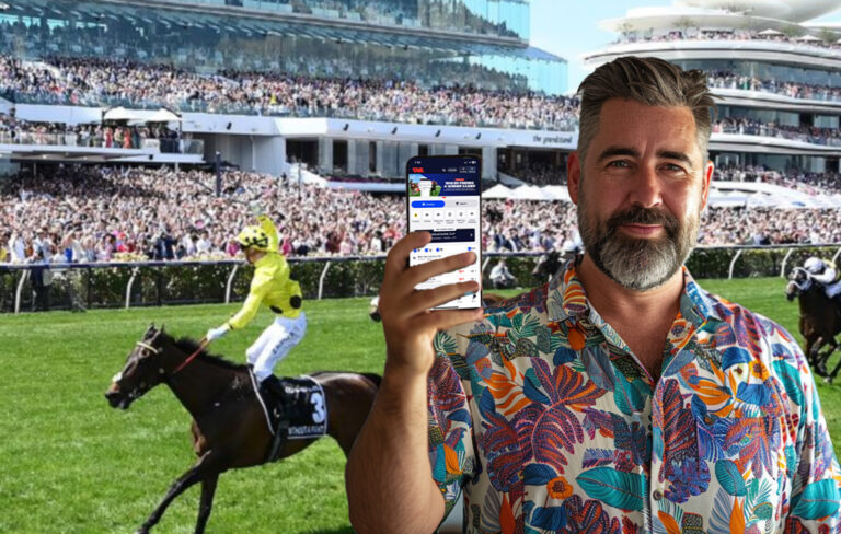 Man with horse race behind him and TAB app open on phone.