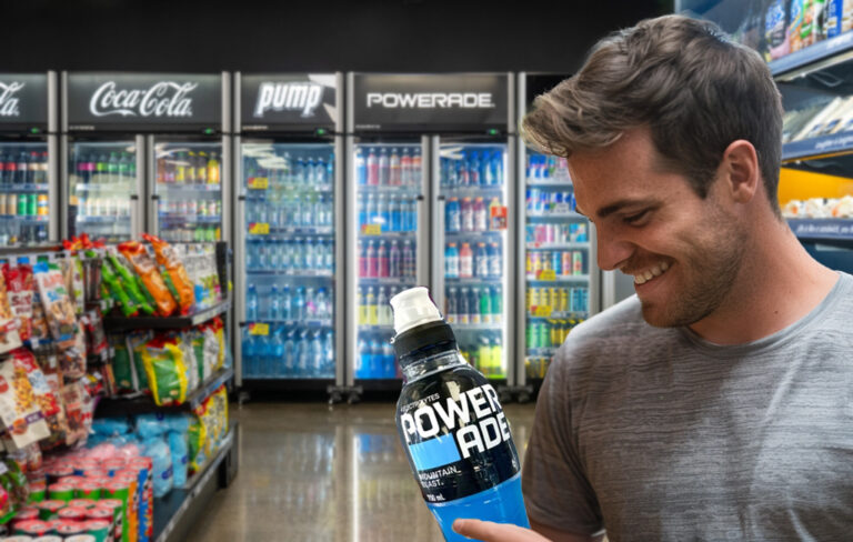 man looking at powerade bottle in Night n day store.