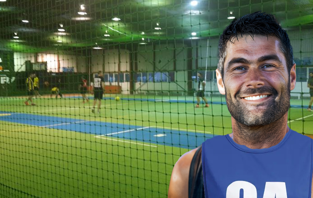 man at indoor netball