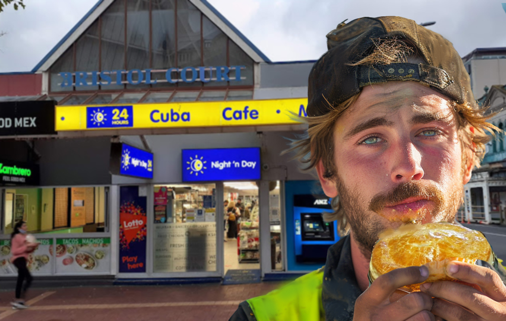 man eating pie in front of Night 'n Day shop
