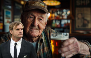 man in pub having beer and scott robertson