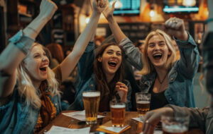 millennials celebrating pub quiz win