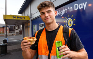 man with pie and v outside night n day